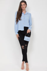 sky blue blouse with matching bag