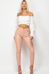 pink high waisted coated jeans 