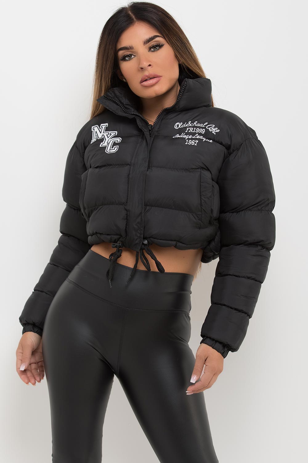 cropped black puffer jacket with nyc slogan