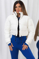 white puffer jacket with drawstring hem