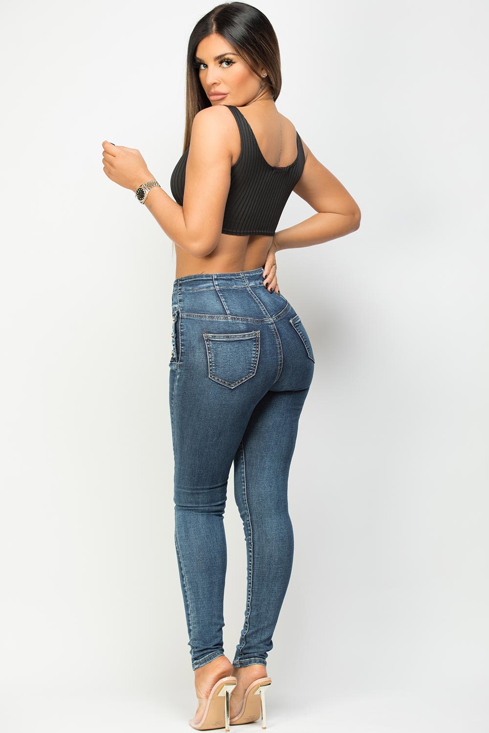 https://styledup.co.uk/cdn/shop/products/denim-blue-high-waisted-jeans-with-gold-buttons-styledup-fashion.jpg?v=1613691192