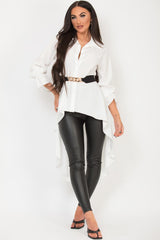 womens white shirt with high low hem and gold chain belt