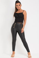 black pu high waisted leggings with gold buttons 