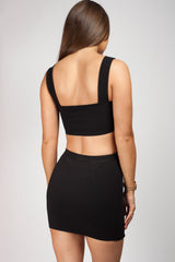 black two piece skirt and top