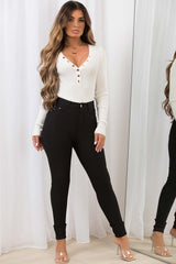 long sleeve bodysuit with gold buttons