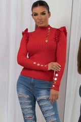 knitted jumper with frill shoulder and gold buttons
