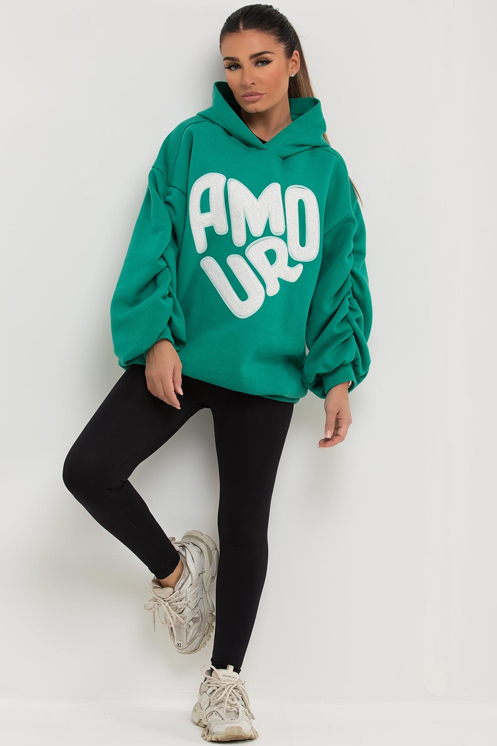 womens oversized hoodie with ruched sleeves and amour towelling slogan