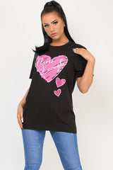 black oversized t shirt with never enough heart print