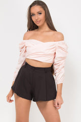 pink wrap top with puff sleeves