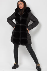womens black puffer down coat with faux fur hood and trim