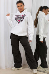 womens oversized hoodie with all you need is love slogan