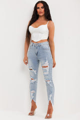 light wash denim skinny ripped jeans with diamante detail uk