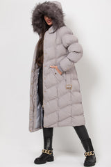 long puffer padded coat with fur hood and belt