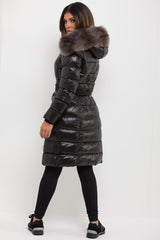 womens long padded puffer jacket with fur hood and belt