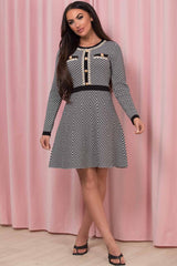 gold button skater dress with long sleeves
