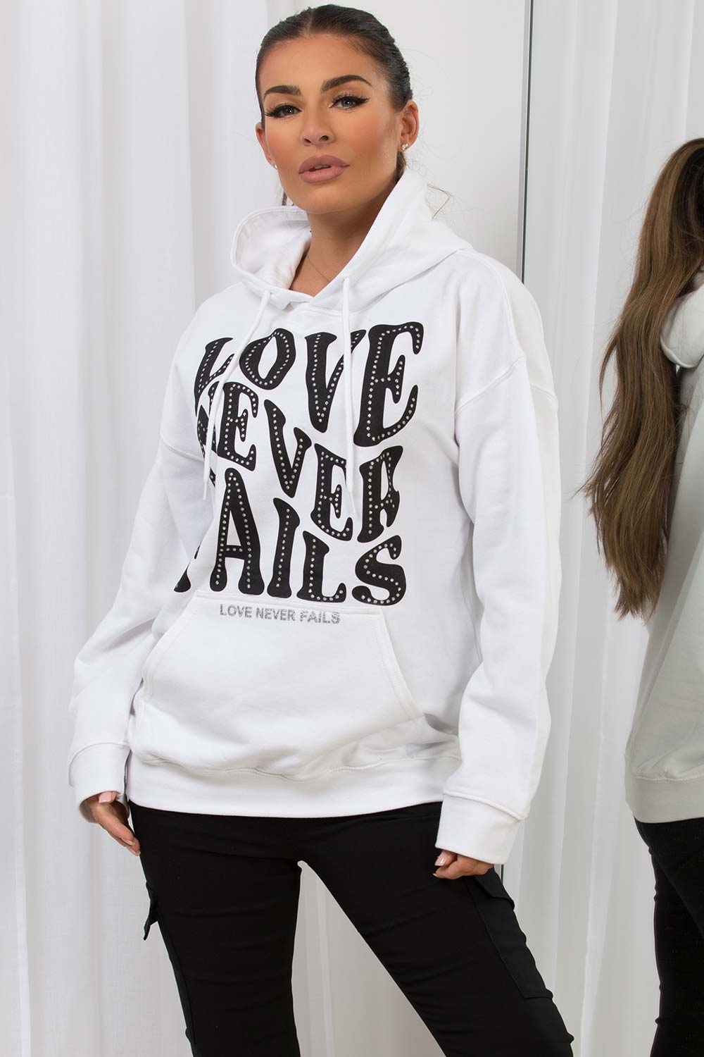 white oversized hoodie love never fails