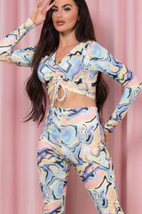 marble print ruched front crop top and wide leg trousers set