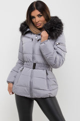 womens grey puffer jacket with belt and fur hood