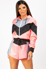 neon pink colour block shell suit 