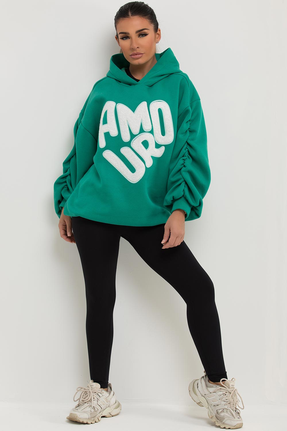 oversized hoodie with ruched sleeves and amour slogan