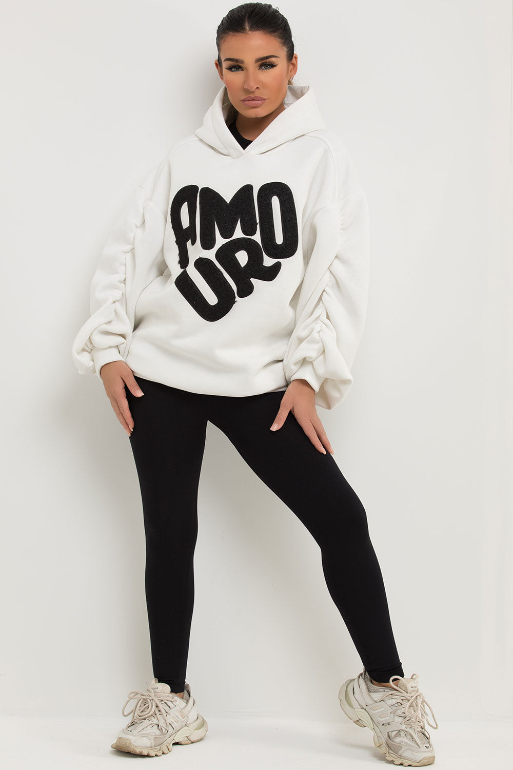 oversized hoodie with ruched sleeves and amour slogan