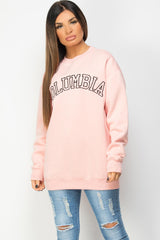 pink sweatshirt with cloumbia embroidery 