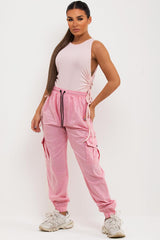 pink shell cargo pants with cuff bottom