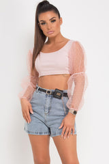 pink crop top with lace sleeves 