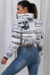 cropped puffer jacket newspaper print