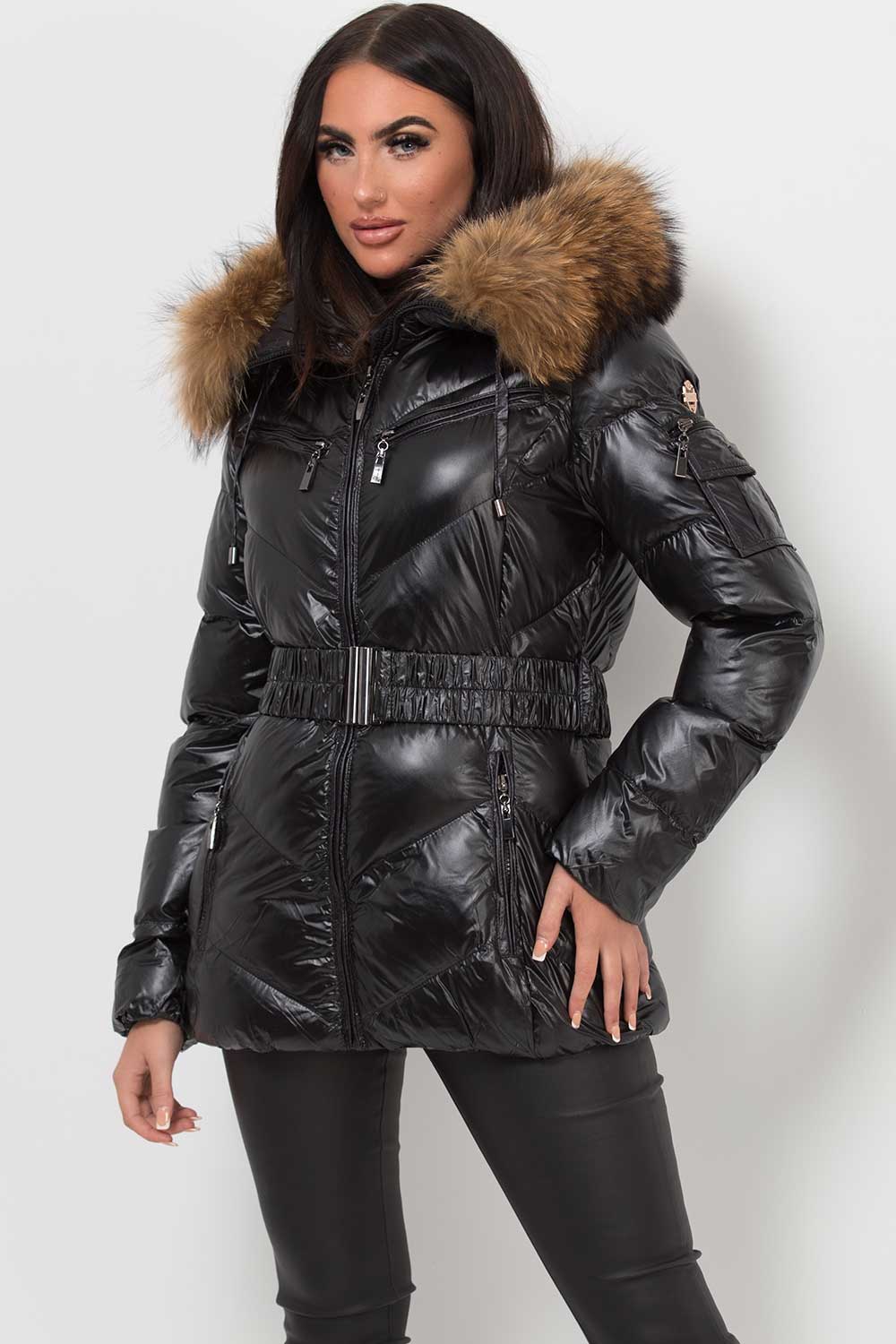 black puffer jacket with raccoon fur hood