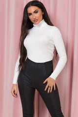 roll neck knitted ribbed jumper