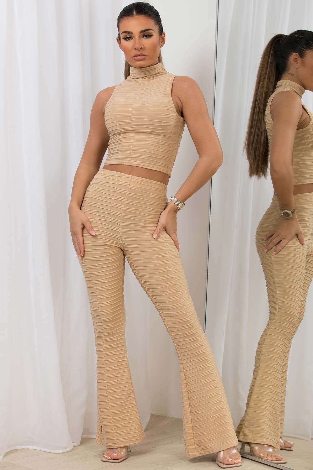 high neck crop top and flared leg skinny trousers co ord set