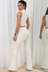 high neck crop top and flared skinny trousers co ord set white