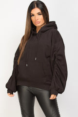 black oversized hoodie with ruched arms 