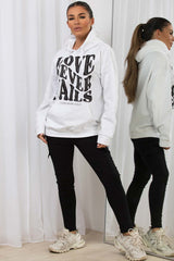 womens oversized with love never fails slogan