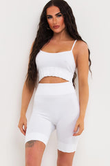 white crop top and cycling shorts gym wear set